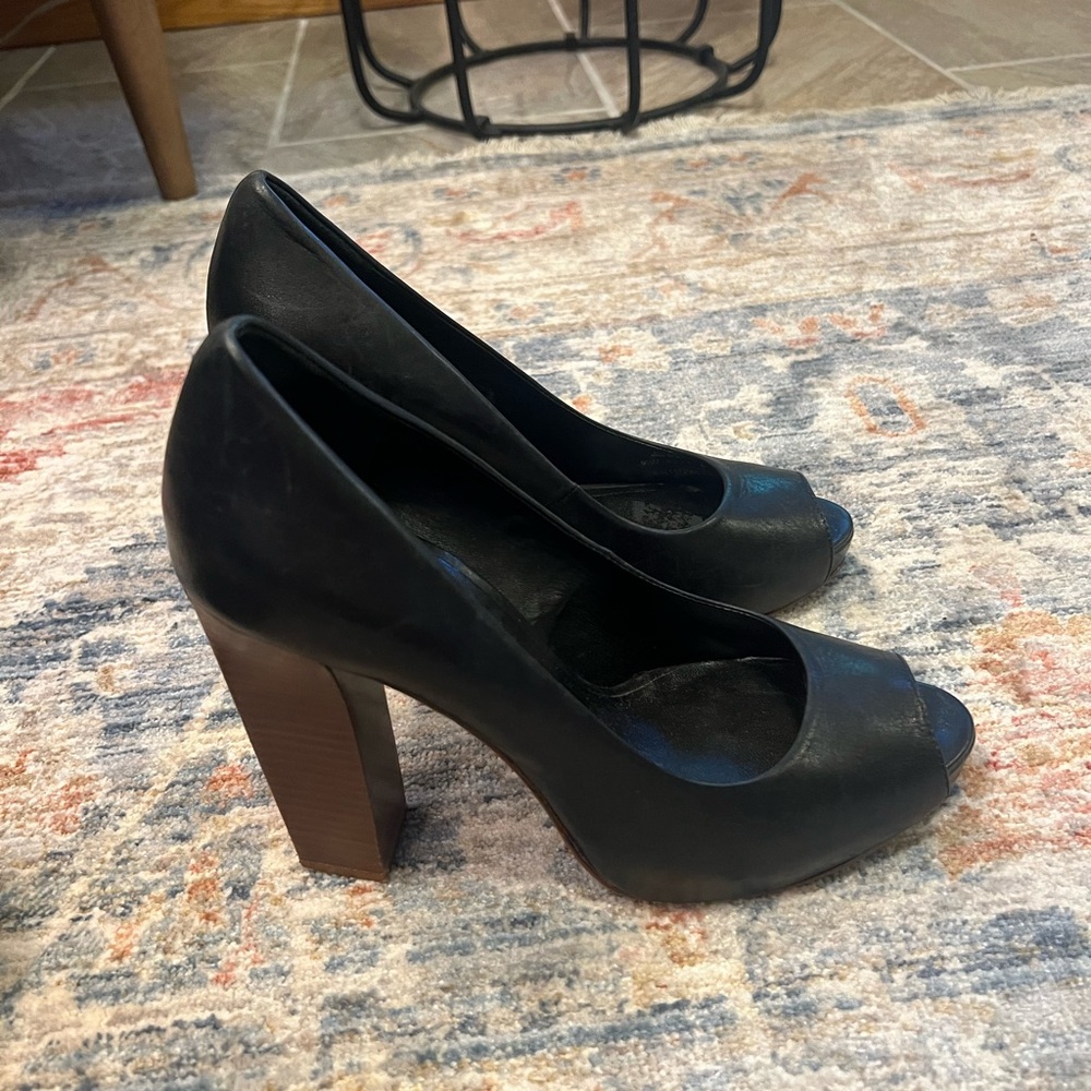 Tory Burch Cantrelle Golden T Leather Block High Heels in Black. Peep toe style.